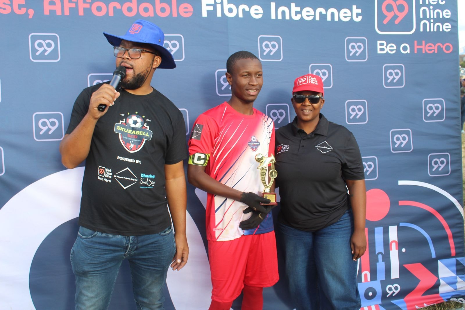 Trophy presentation at the Skuzabell tournament awards ceremony