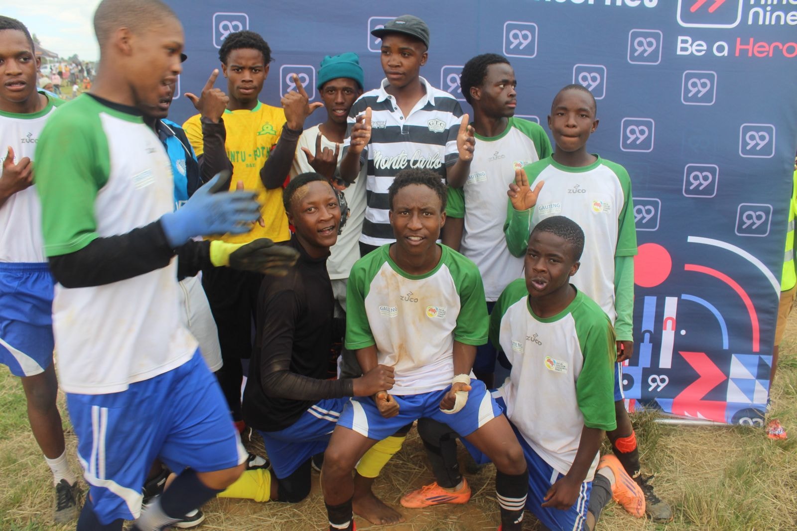 Youth soccer players celebrating at a tournament